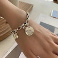 Silbernes Bettelarmband mit geometrischen Herzen – Liana