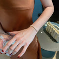Goldenes Bettelarmband mit Zirkon-Schmuck für Partys – Emily