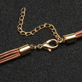 Goldene Feder Halskette Leder Boho Schmuck – Sophia