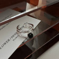 Silberner Multilinien-Ring mit schwarzem Onyx – Dorian