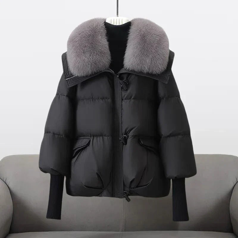 Lange Damen Daunenjacke mit Kunstpelzkragen – Elessia