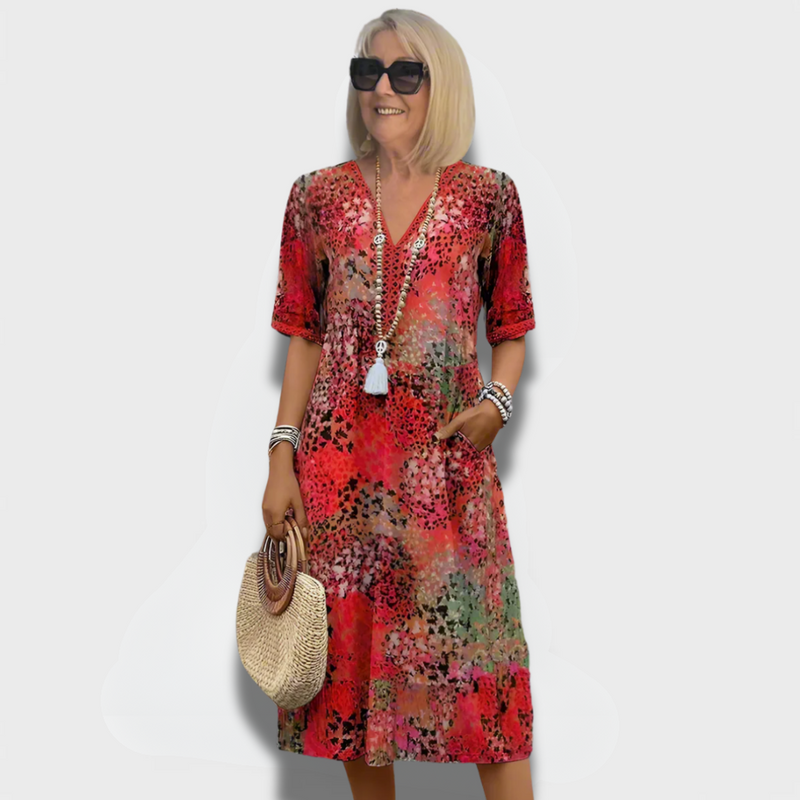 Vibrantes Midi-Kleid mit Taschen und Muster – Elara