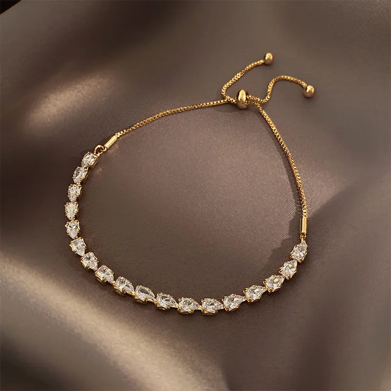 Goldenes Bettelarmband mit Zirkon-Schmuck für Partys – Emily