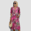 Vibrantes Midi-Kleid mit Taschen und Muster – Elara