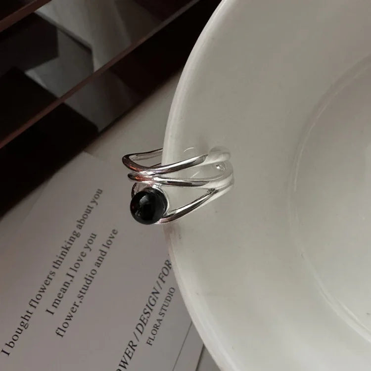 Silberner Multilinien-Ring mit schwarzem Onyx – Dorian